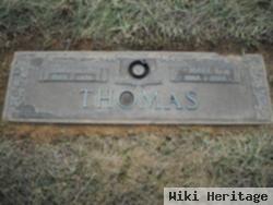 Albert M Thomas