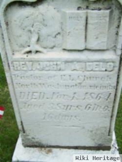 Rev John A Delo