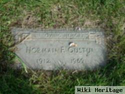 Norman F Gustin