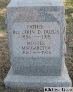 Rev John D Dueck