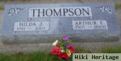 Arthur E Thompson