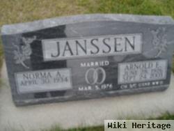 Arnold E Janssen