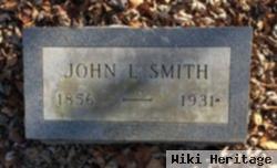 John L Smith