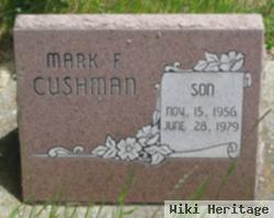 Mark F Cushman