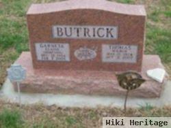 Thomas W Butrick