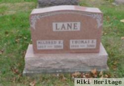 Thomas E Lane