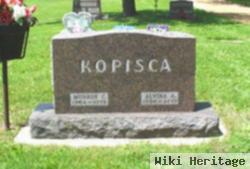 Monroe C Kopisca