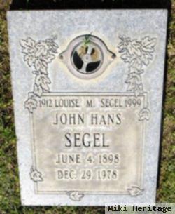 Louise M Segel