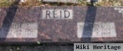 Lon E Reid