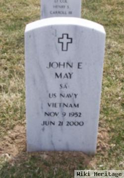 John E May