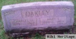 Charles H Oakley