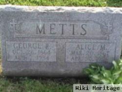 George R Metts