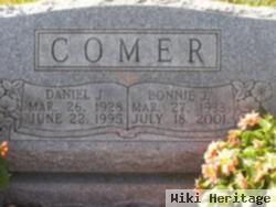 Daniel J Comer