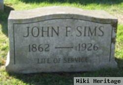 John F Sims