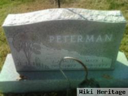 Mark L Peterman