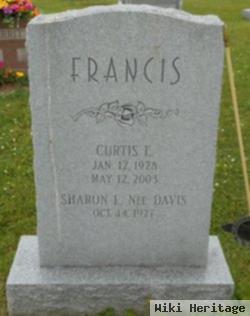 Curtis E Francis