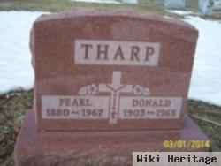 Donald E Tharp