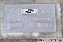 Arthur J Comstock