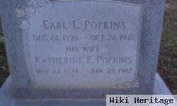 Earl L Popkins