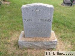 John F Thomas