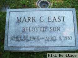 Mark C East