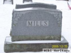 Allen E. Mills