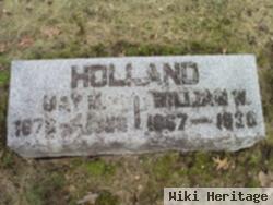 William W Holland