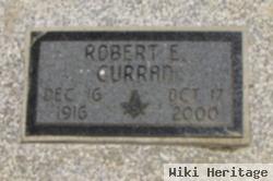 Robert E Curran