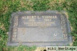 Albert L Vidmar