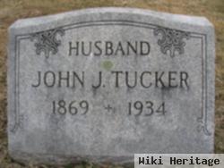 John J Tucker