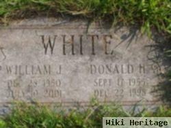 William J White