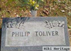 Phillip M Toliver