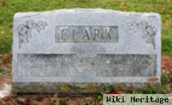 Howard E Clark