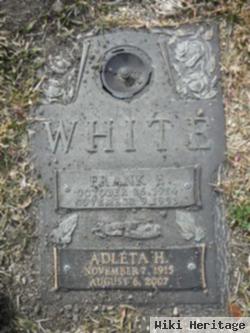 Frank F White