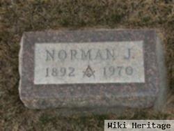 Norman J Good