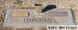 Louise E Huggins