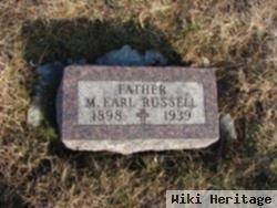 M Earl Russell