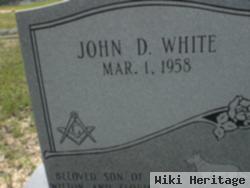 John D White