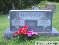 Harland E Fluharty