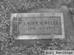 Laura M Welke