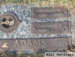 Thomas E Adams