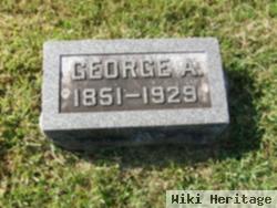 Dr George A Greeson