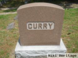 George W Curry