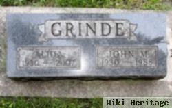 John M. Grinde