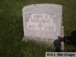 John H Huelsman