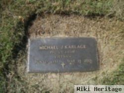 Michael J Karlage