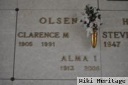 Clarence M Olsen