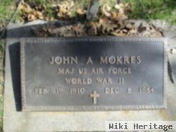 John A. Mokres