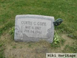 Curtis E Cope