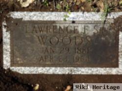 Lawrence F Woods